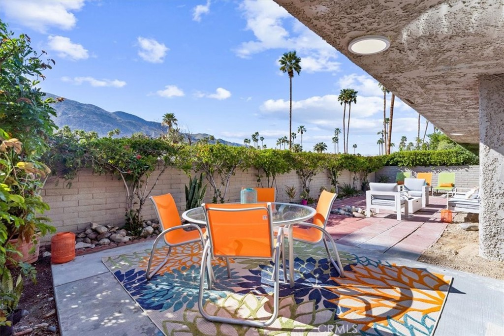1111 Ramon Road, Unit 87 Palm Springs, CA 92264 - Photo 41 of 54 an outdoor space with patio furniture