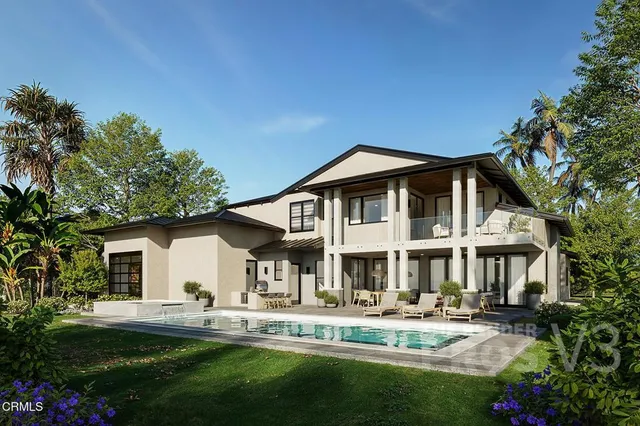 a front view of a house with swimming pool having outdoor seating