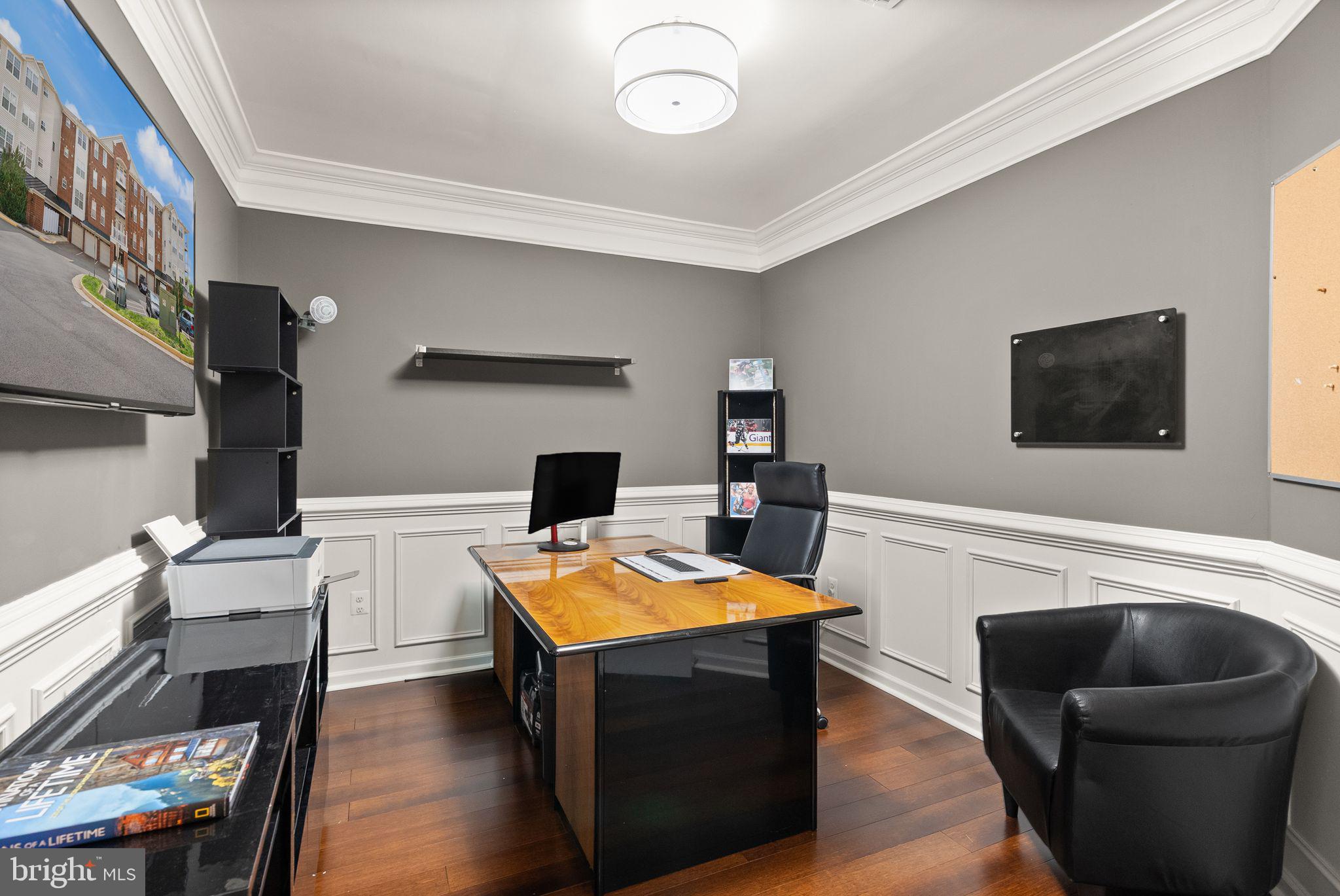 9710 Handerson Place, Unit 1 Manassas Park, VA 20111 - Photo 11 of 41 a living room with furniture and a flat screen tv