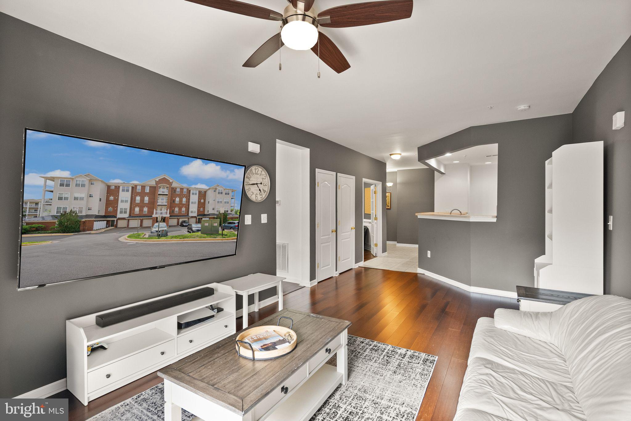 9710 Handerson Place, Unit 1 Manassas Park, VA 20111 - Photo 16 of 41 a living room with couch and a large window