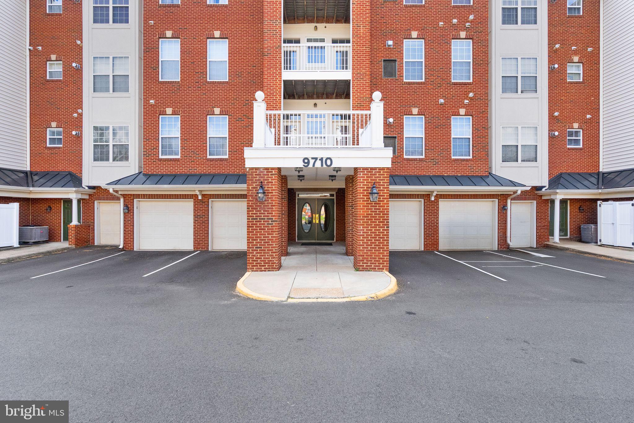 9710 Handerson Place, Unit 1 Manassas Park, VA 20111 - Photo 2 of 41 a view of a building with a street