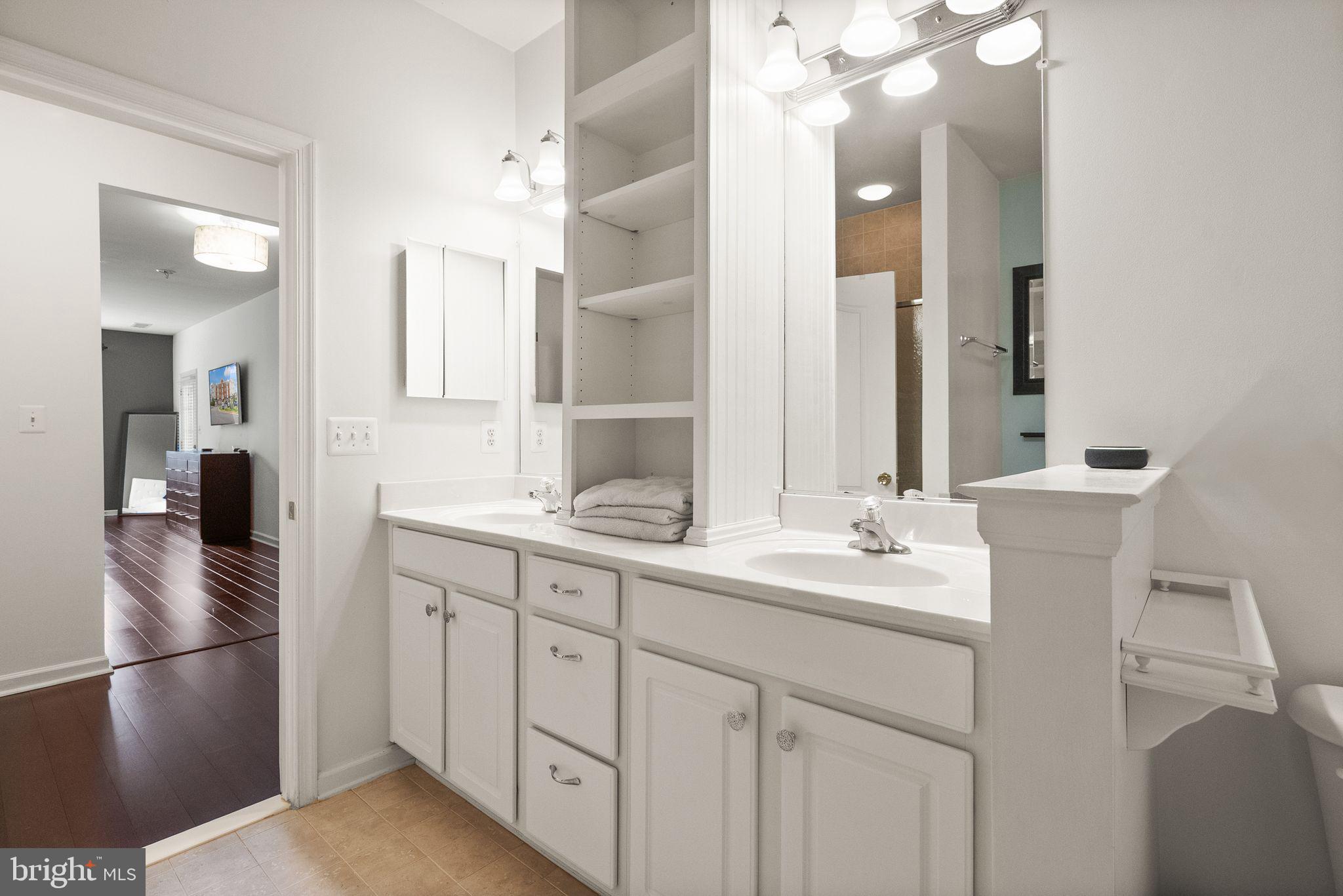 9710 Handerson Place, Unit 1 Manassas Park, VA 20111 - Photo 23 of 41 a bathroom with a sink double vanity granite and a mirror