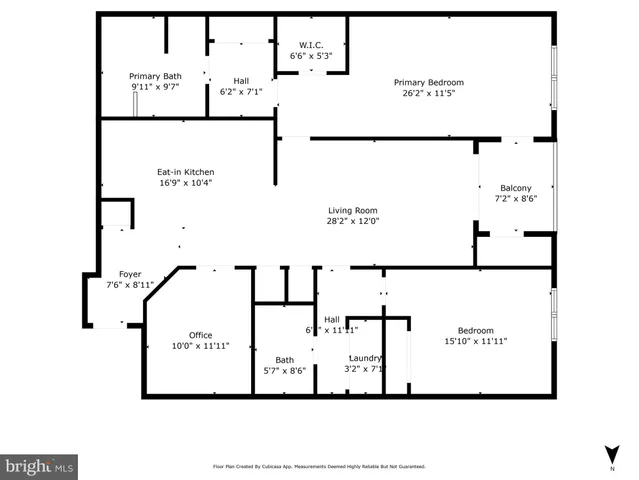 a front view of a multi story residential apartment building with a yard