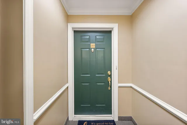 a view of a bathroom from a hallway