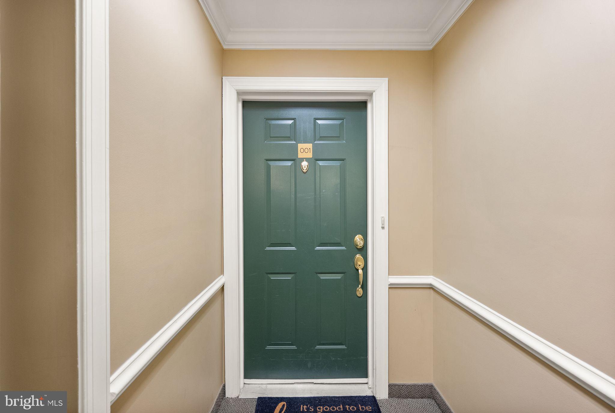 9710 Handerson Place, Unit 1 Manassas Park, VA 20111 - Photo 5 of 41 a view of a bathroom from a hallway