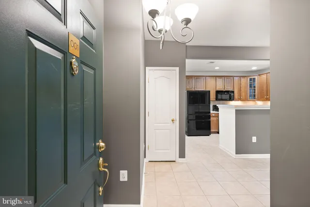 a view of a kitchen from the hallway