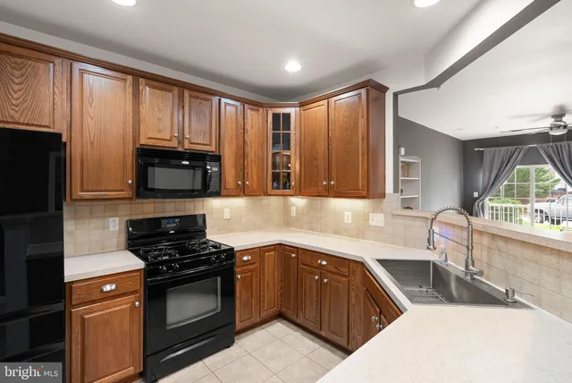 a bathroom with a sink a vanity and a mirror