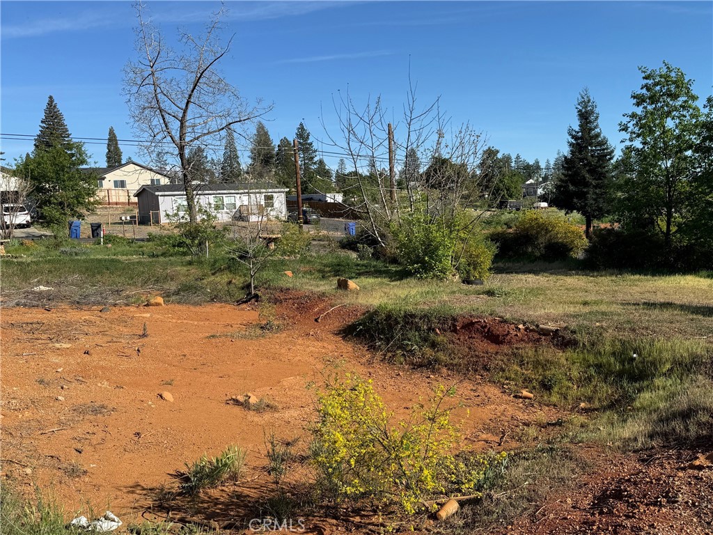 5701 Newland Road Paradise, CA 95969 - Photo 3 of 11 a view of a yard with yellow house