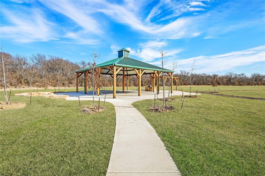 3116 Harmony Way Cleburne, TX 76031 - Photo 20 of 23 a view of a swimming pool with an outdoor seating