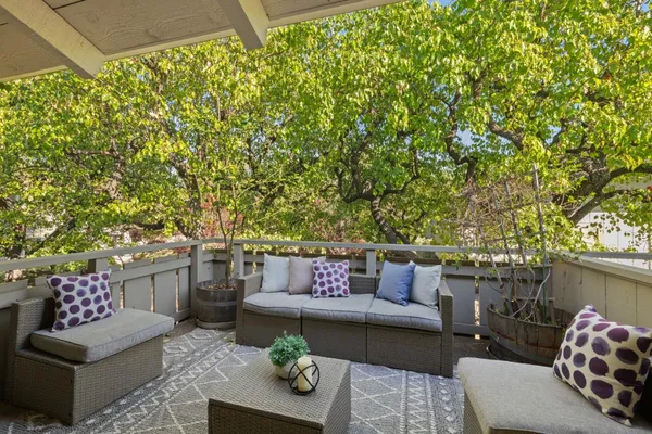 a outdoor living space with furniture and a potted plant