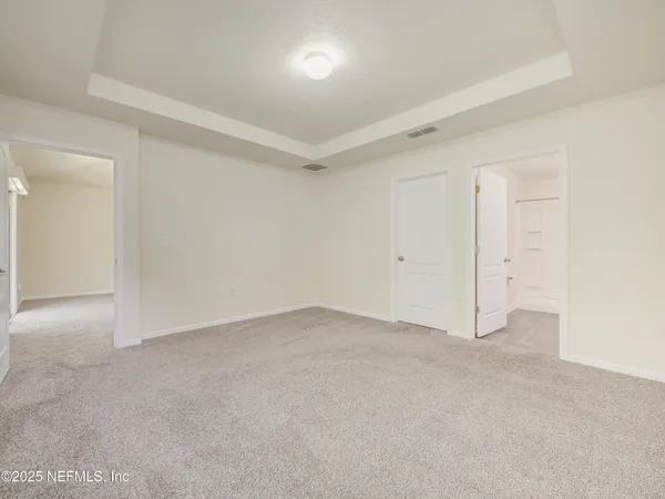 an empty room with an entryway