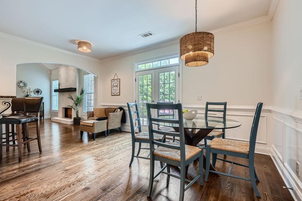 4829 Moon Road Powder Springs, GA 30127 - Photo 17 of 51 a view of a dining room with furniture window and wooden floor