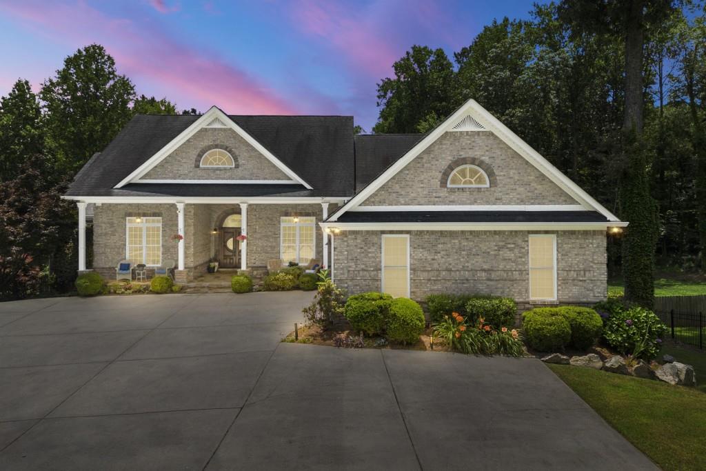 4829 Moon Road Powder Springs, GA 30127 - Photo 3 of 51 a front view of a house with a yard