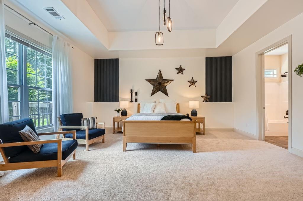 4829 Moon Road Powder Springs, GA 30127 - Photo 37 of 51 a living room with furniture and large windows