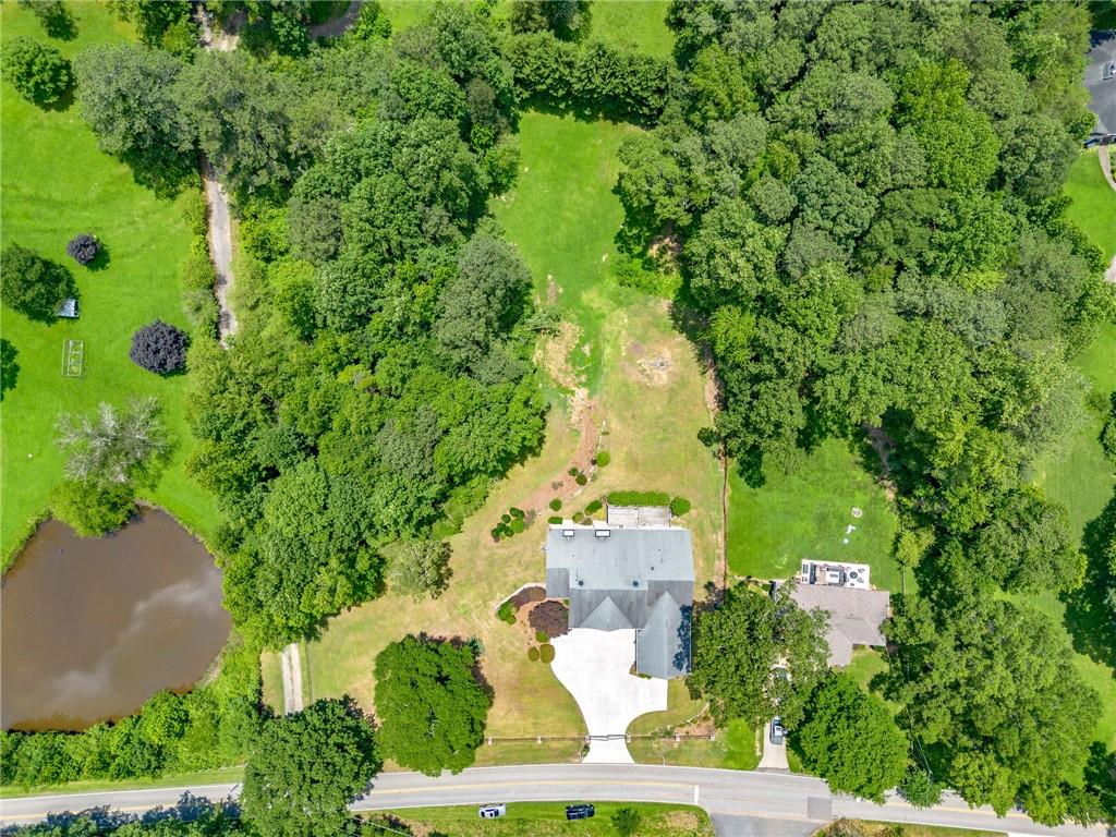 4829 Moon Road Powder Springs, GA 30127 - Photo 47 of 51 an aerial view of a house with a yard