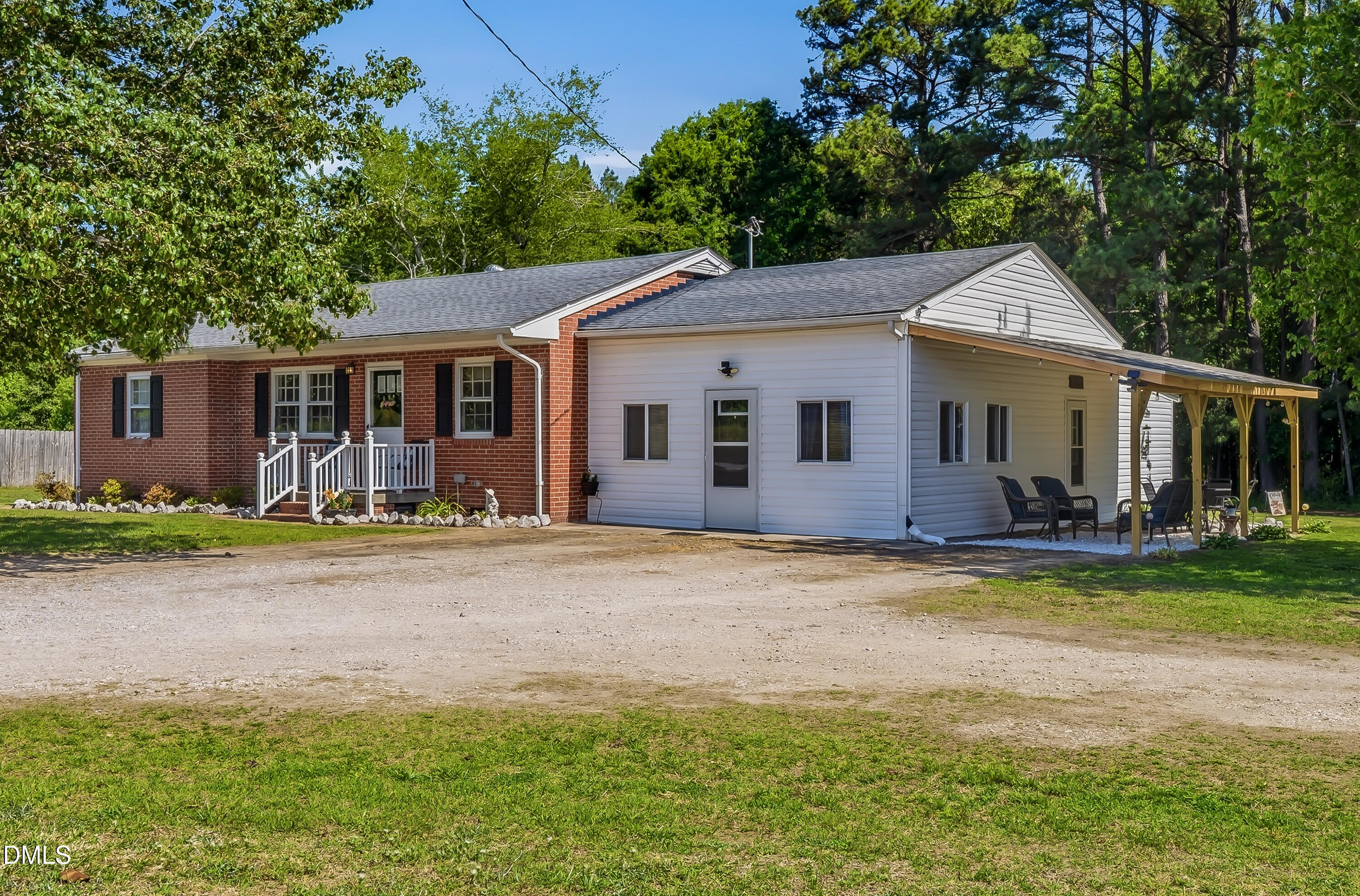 4967 Highway 581 Spring Hope, NC 27882 - Photo 2 of 44 a view of a house with backyard and a tree