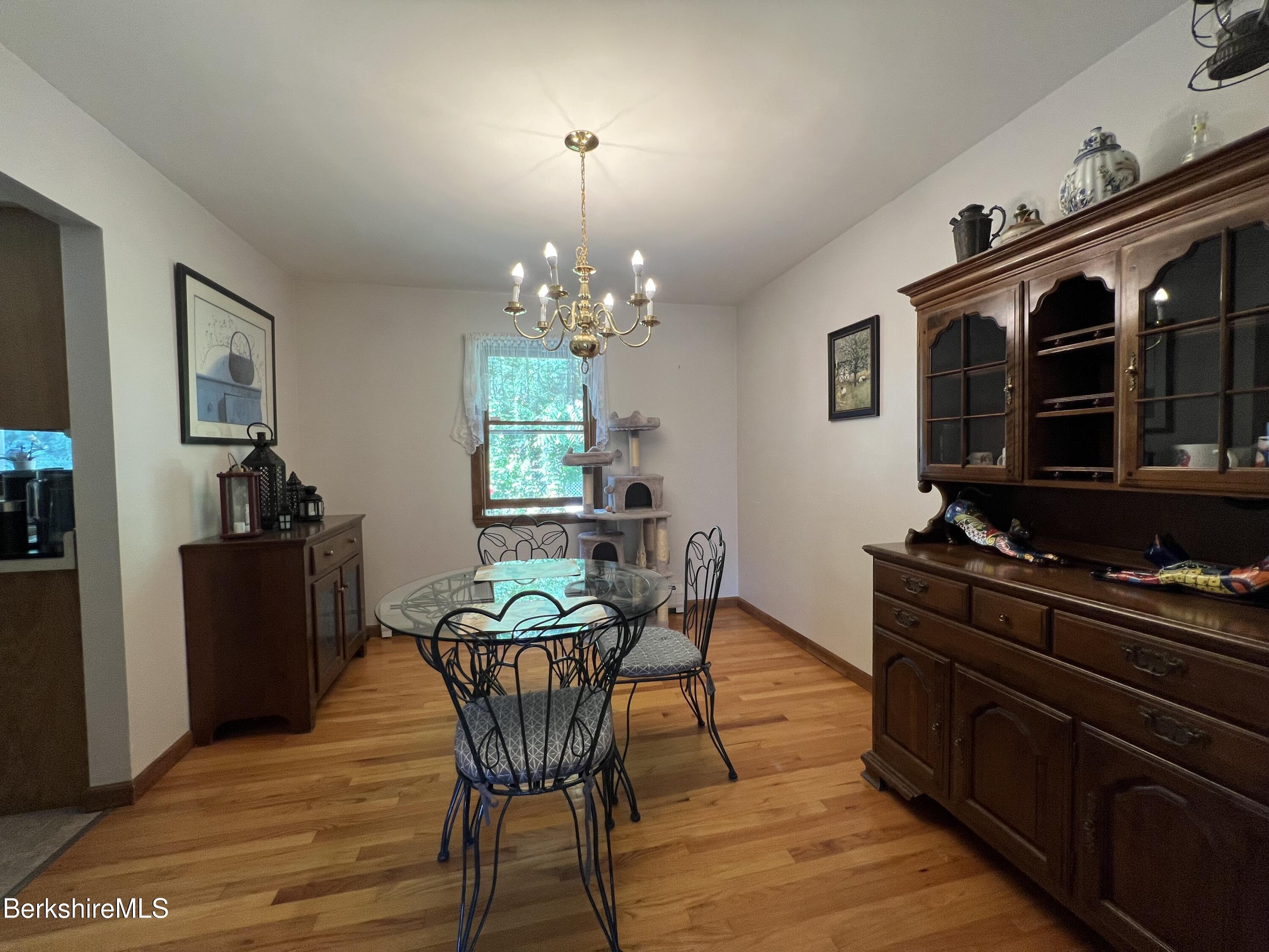 215 Partridge Road Pittsfield, MA 01201 - Photo 15 of 38 a dining room with furniture and window