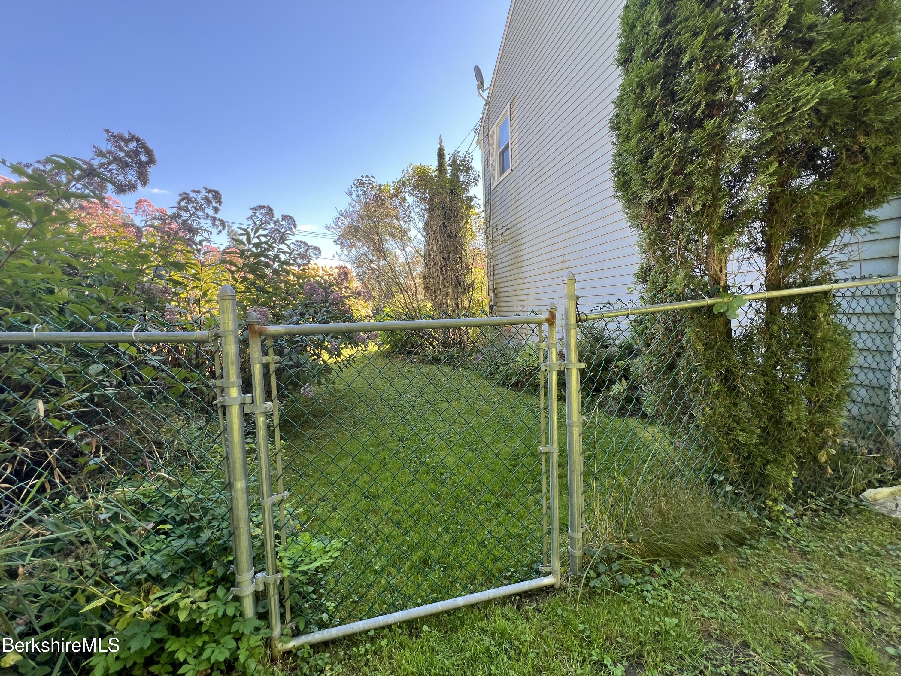 215 Partridge Road Pittsfield, MA 01201 - Photo 19 of 38 a view of a small yard