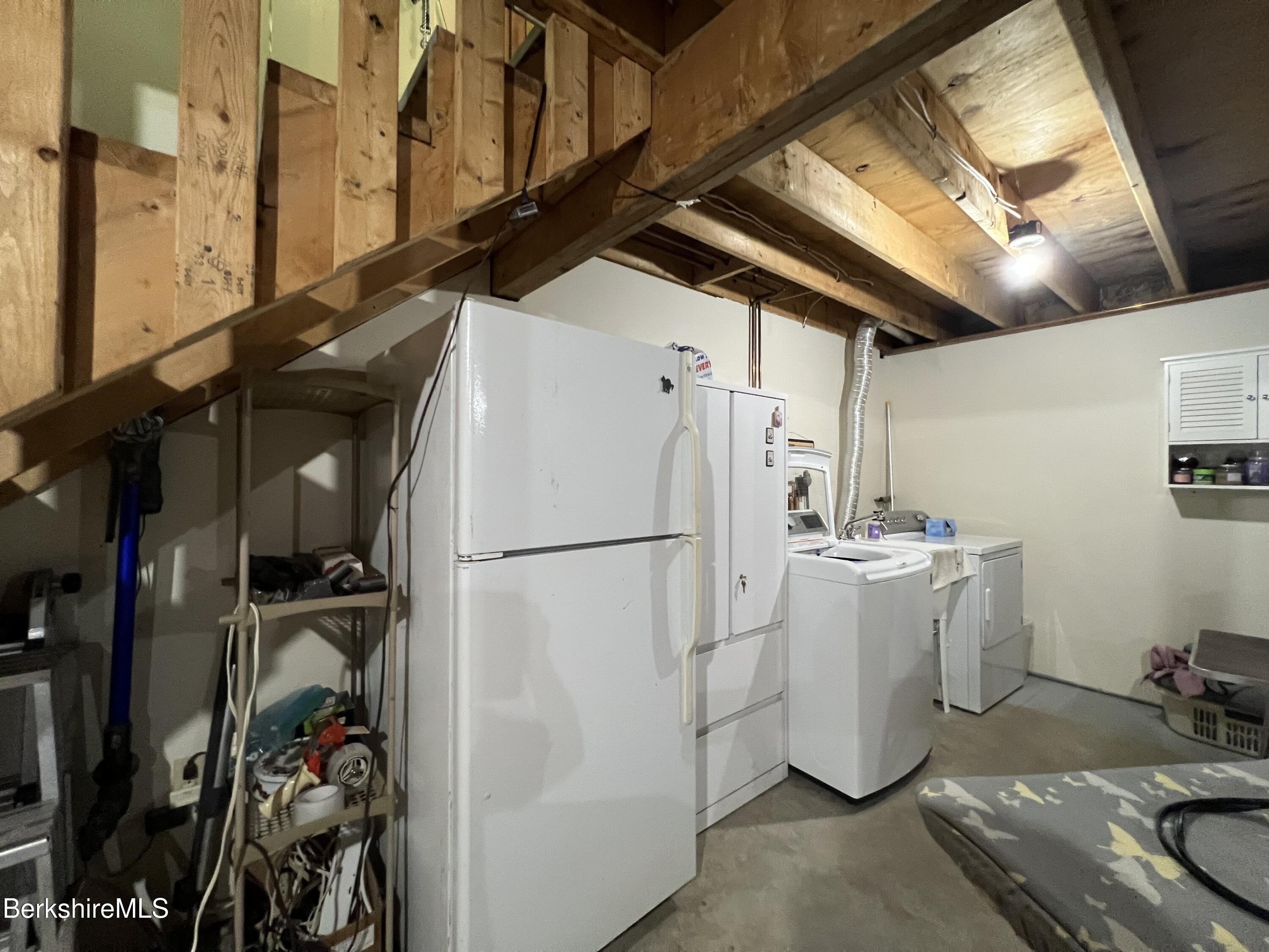 215 Partridge Road Pittsfield, MA 01201 - Photo 34 of 38 a utility room with dryer and washer