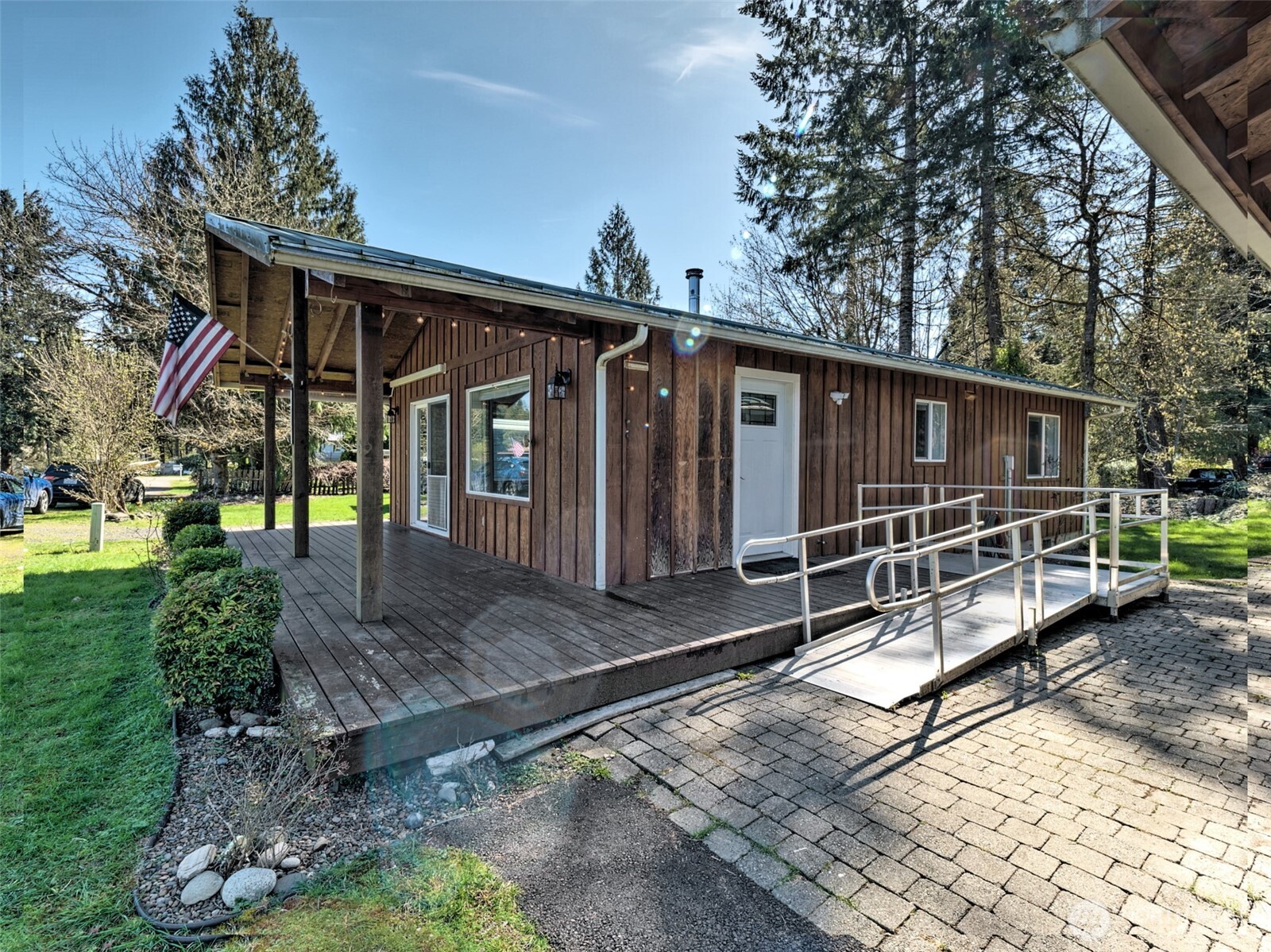 30 Brook Place Tahuya, WA 98588 - Photo 1 of 40 a view of house with deck outdoor seating and yard