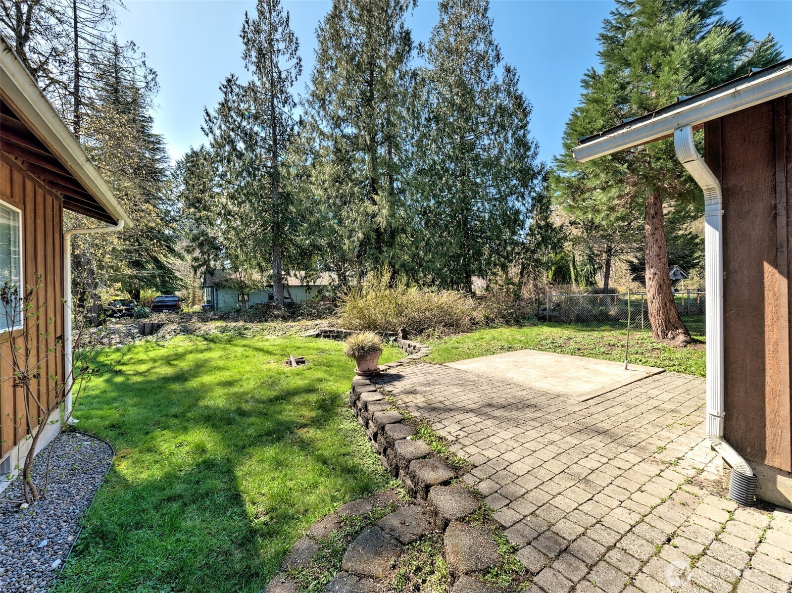 30 Brook Place Tahuya, WA 98588 - Photo 11 of 40 a view of a yard with yellow house