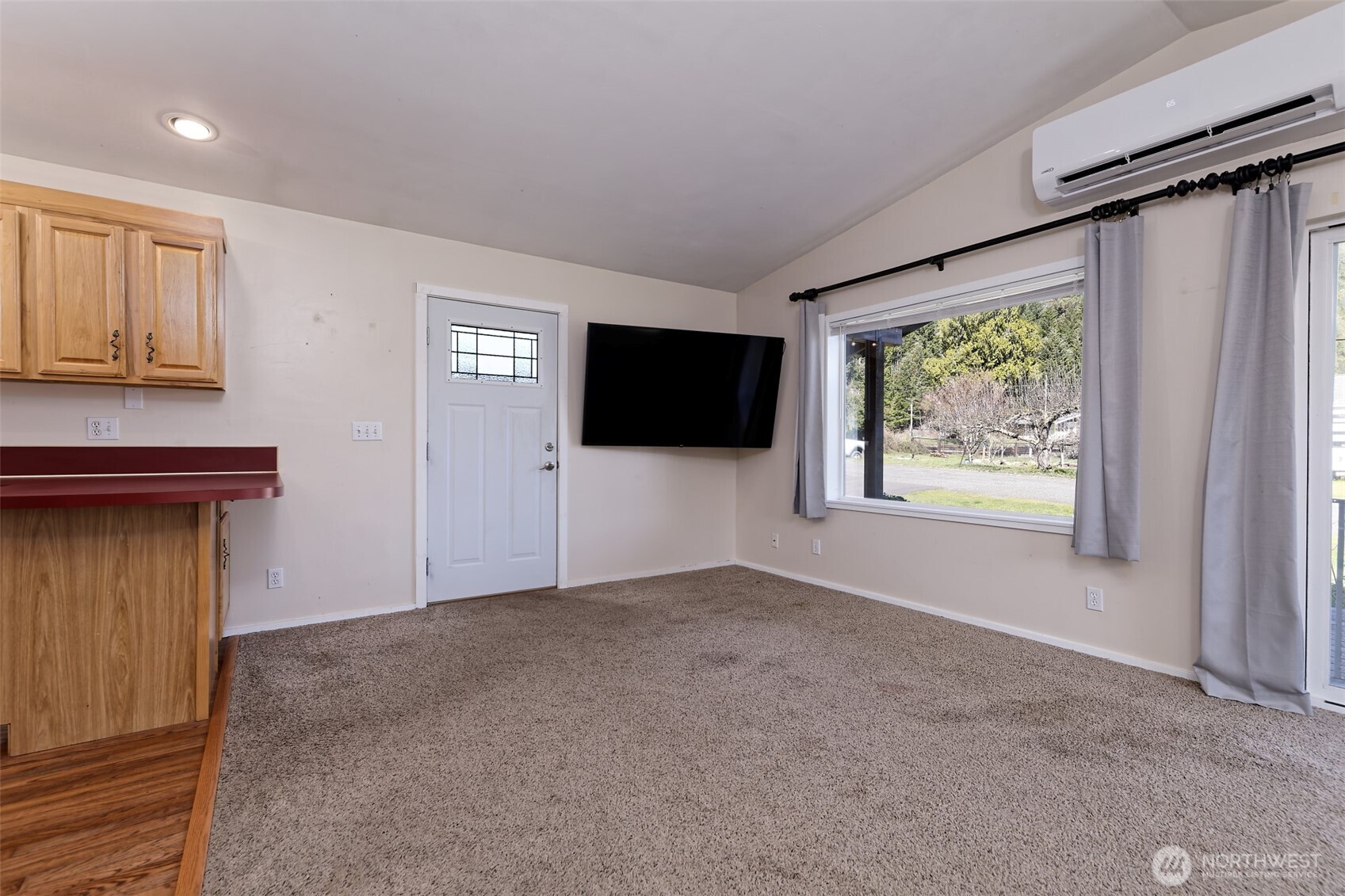 30 Brook Place Tahuya, WA 98588 - Photo 24 of 40 a view of a livingroom with an empty space and a window