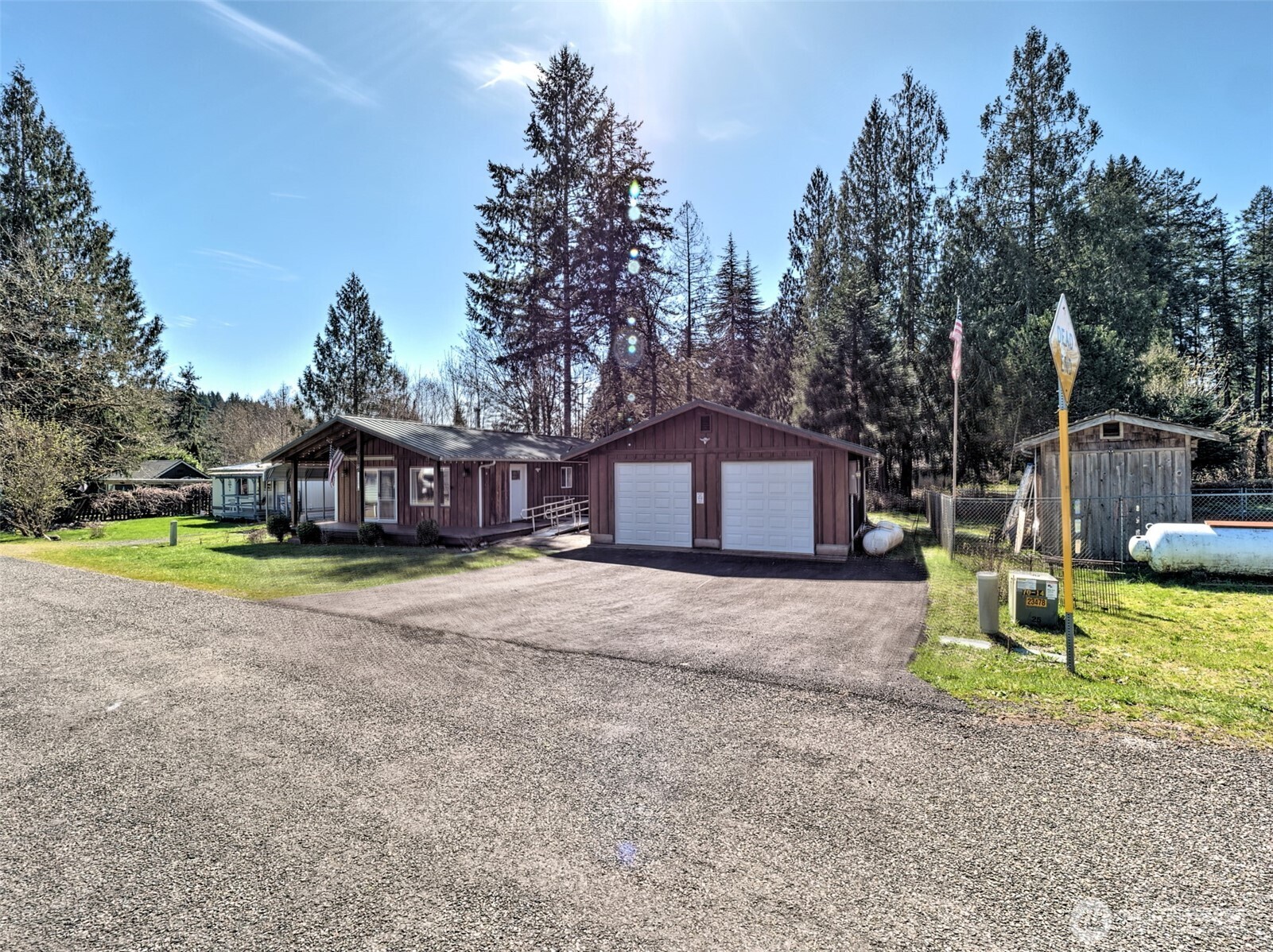 30 Brook Place Tahuya, WA 98588 - Photo 5 of 40 a view of a house with a yard and tree s