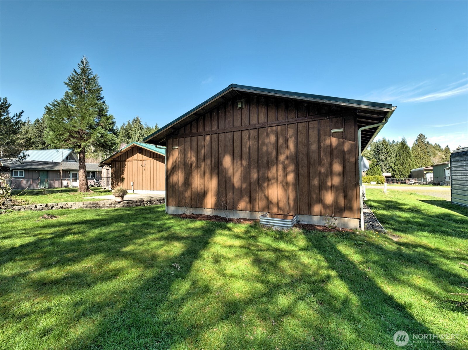 30 Brook Place Tahuya, WA 98588 - Photo 7 of 40 a house with garden in front of it