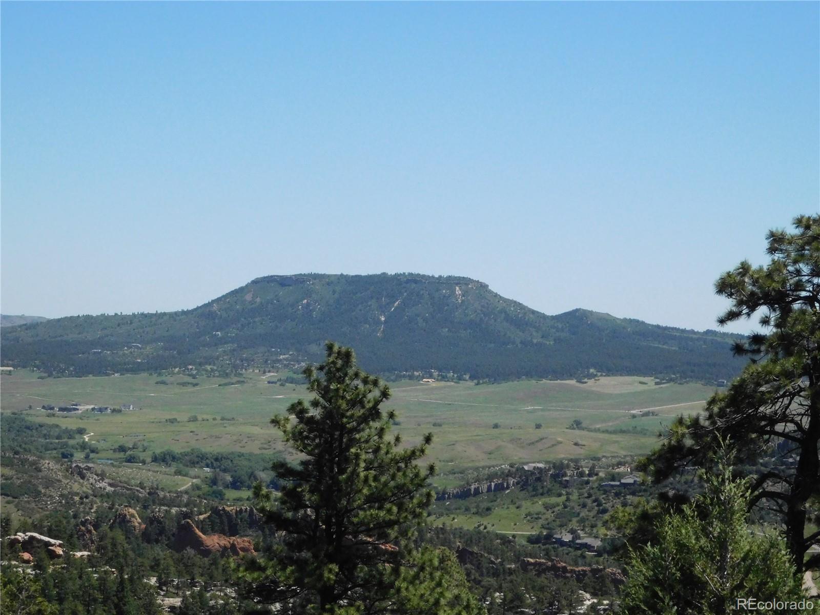 5900 Pawnee Road Larkspur, CO 80118 - Photo 21 of 45 a view of mountain and a mountain