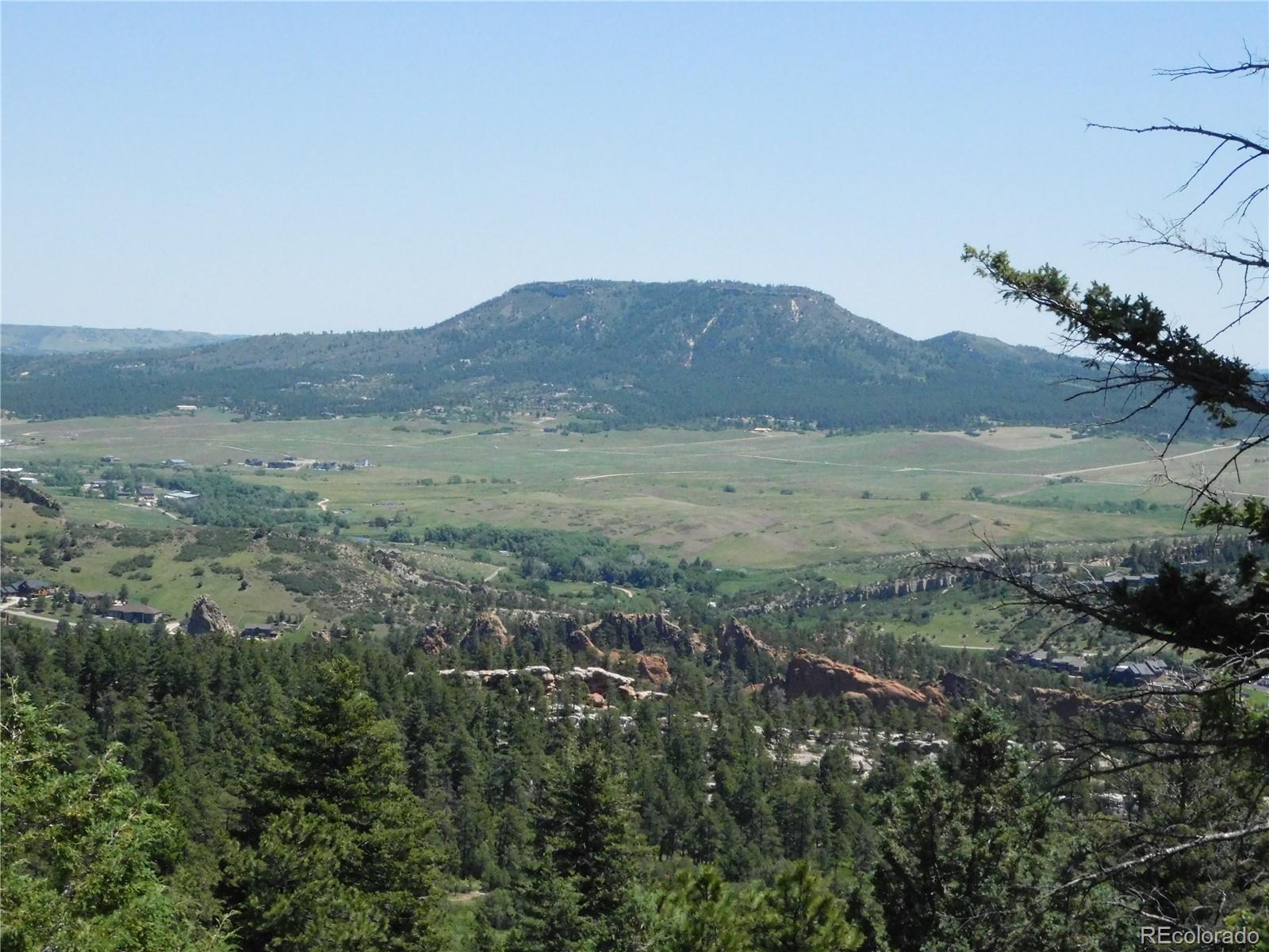 5900 Pawnee Road Larkspur, CO 80118 - Photo 28 of 45 a view of a field with an ocean