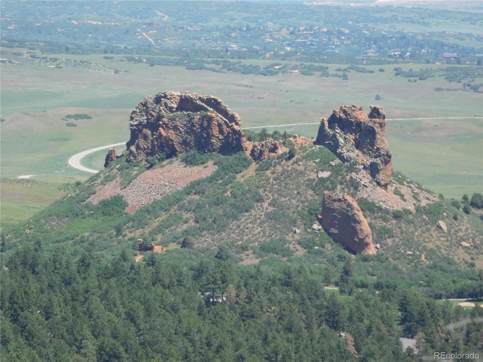 5900 Pawnee Road Larkspur, CO 80118 - Photo 40 of 45 a view of a lake with a mountain