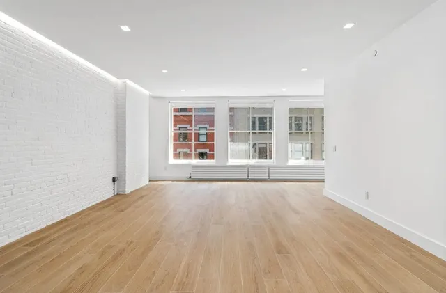 a picture of floor with a bench