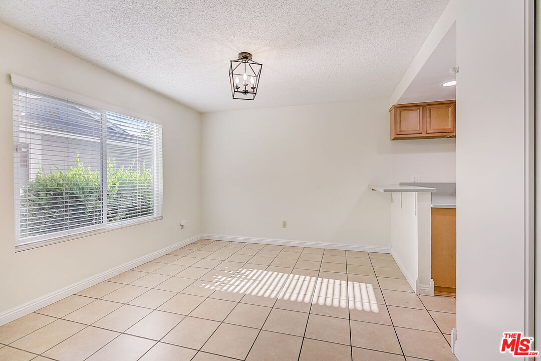 537 Spring Road, Unit 27 Moorpark, CA 93021 - Photo 13 of 30 a view of an empty room with a window