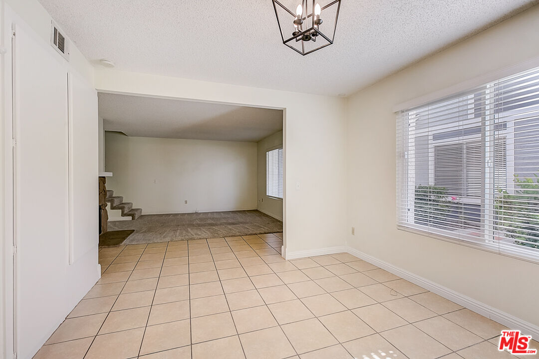 537 Spring Road, Unit 27 Moorpark, CA 93021 - Photo 15 of 30 a view of an empty room and window
