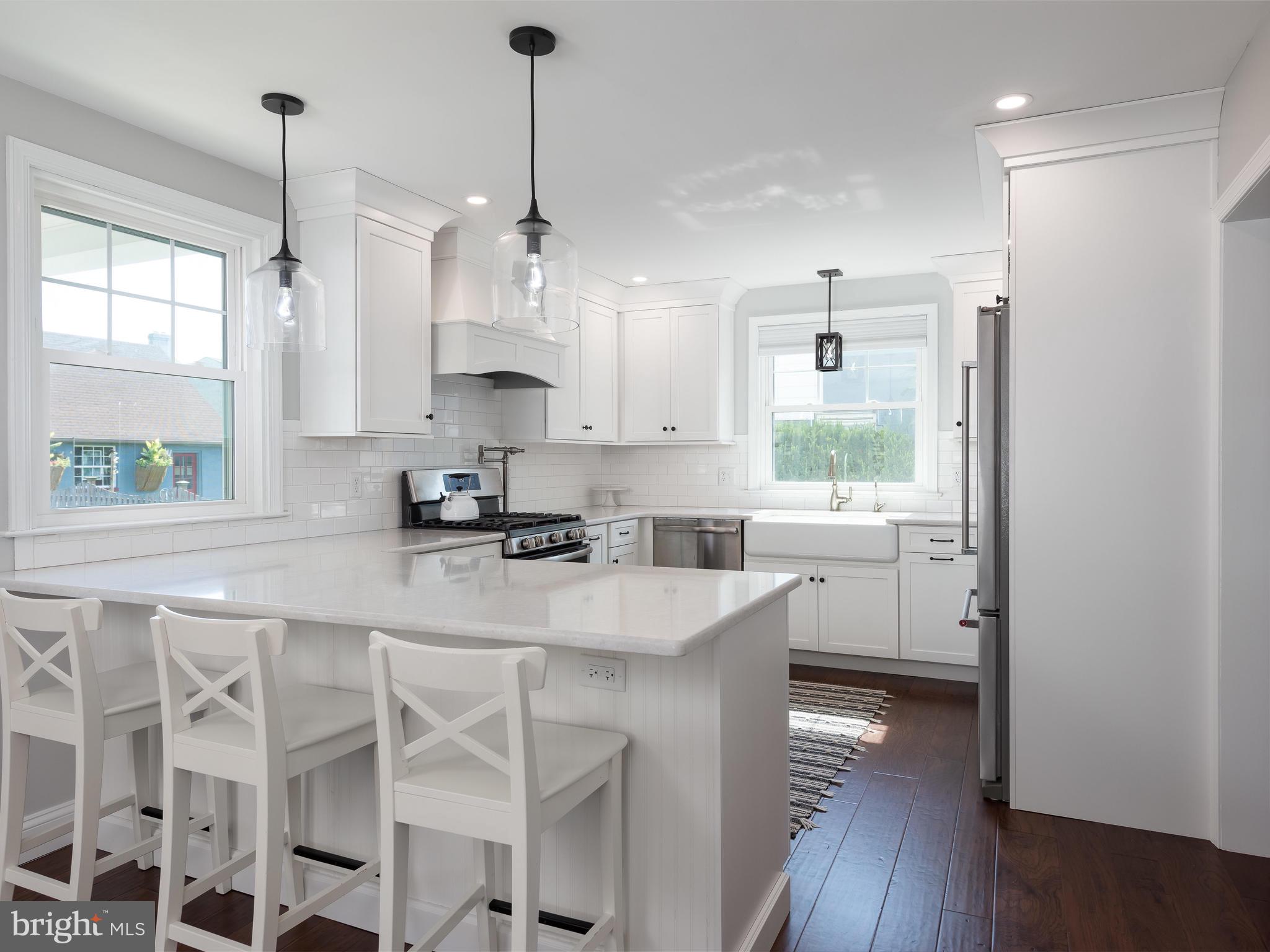 117 Gallagher Road Wayne, PA 19087 - Photo 22 of 47 Quartz countertops and breakfast bar