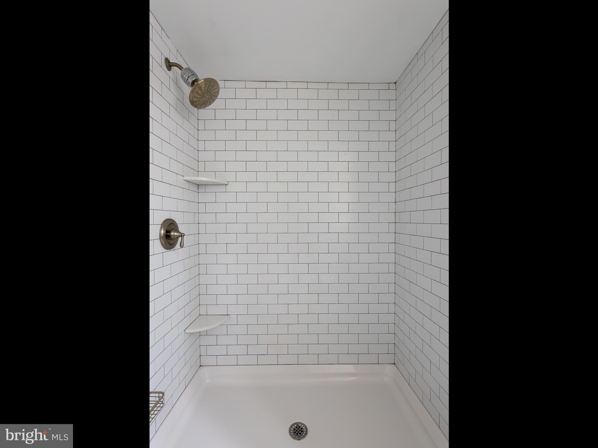 117 Gallagher Road Wayne, PA 19087 - Photo 32 of 47 Beautifully tiled master bath shower