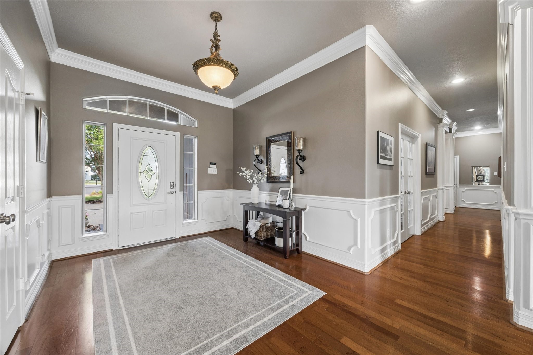 16519 Deerhaven Run Rosharon, TX 77583 - Photo 3 of 47 a view of a livingroom with furniture wooden floor and a ceiling fan