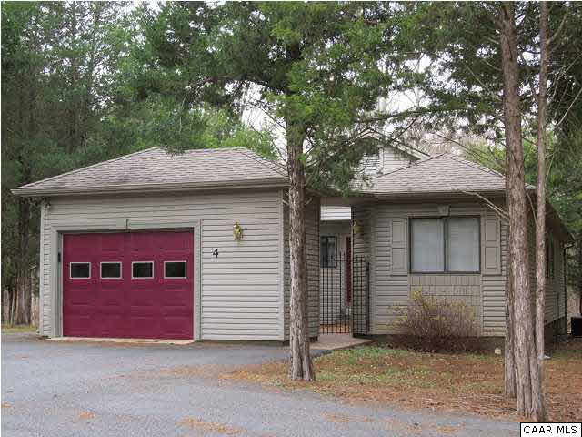 Elegant custom home with numerous upgrades.   Walk to shopping & restaurants.