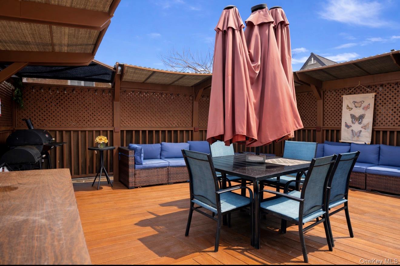 1925 Radcliff Avenue Bronx, NY 10462 - Photo 19 of 27 a view of a dinning table and chairs in the patio