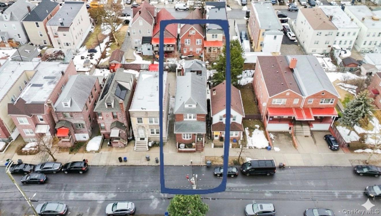 1925 Radcliff Avenue Bronx, NY 10462 - Photo 27 of 27 an aerial view of multi story residential apartment building with parking