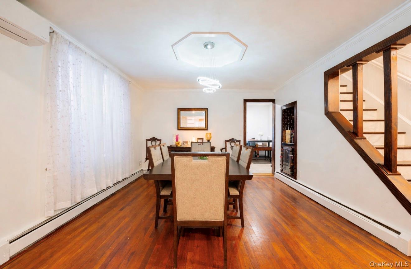 1925 Radcliff Avenue Bronx, NY 10462 - Photo 5 of 27 a view of a dining room with furniture window and wooden floor