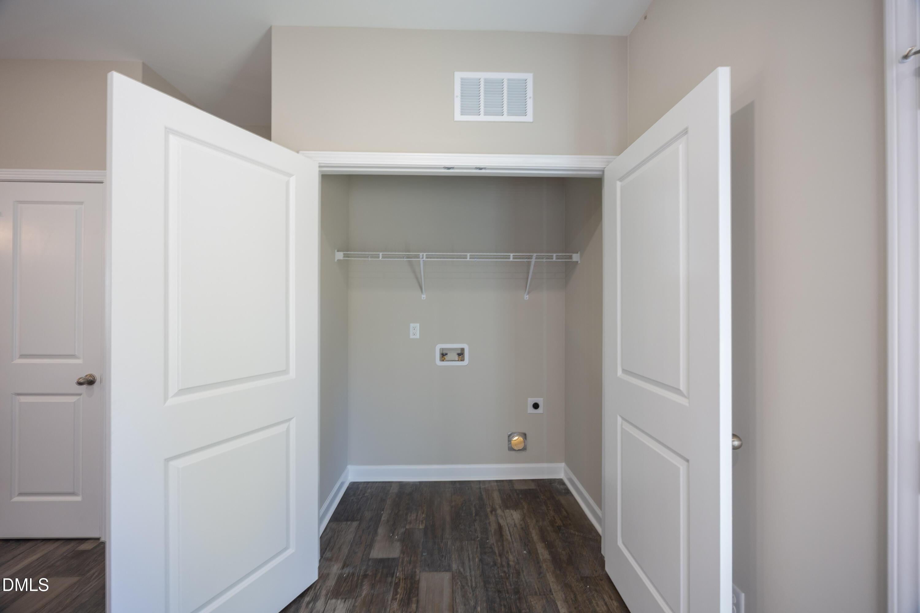 179 West Hamer Street Coats, NC 27521 - Photo 11 of 26 a view of a room with wooden floor