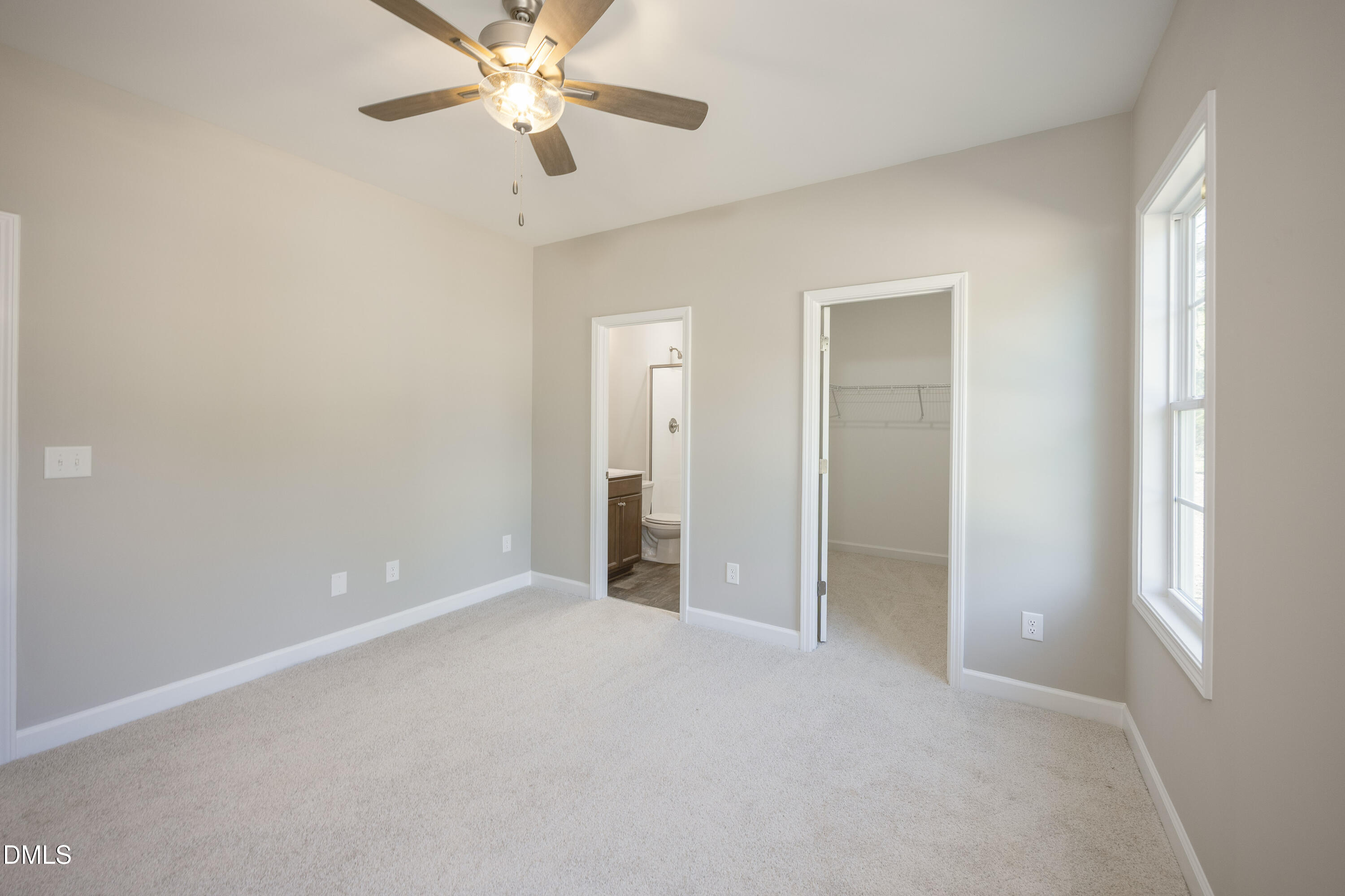 179 West Hamer Street Coats, NC 27521 - Photo 14 of 26 a view of an empty room with a window
