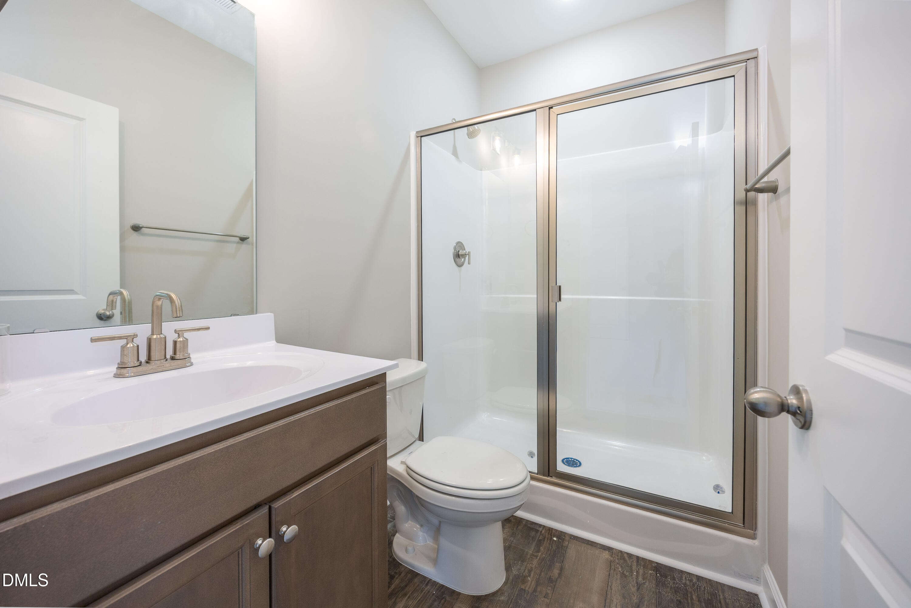 179 West Hamer Street Coats, NC 27521 - Photo 16 of 26 a bathroom with a sink toilet and shower