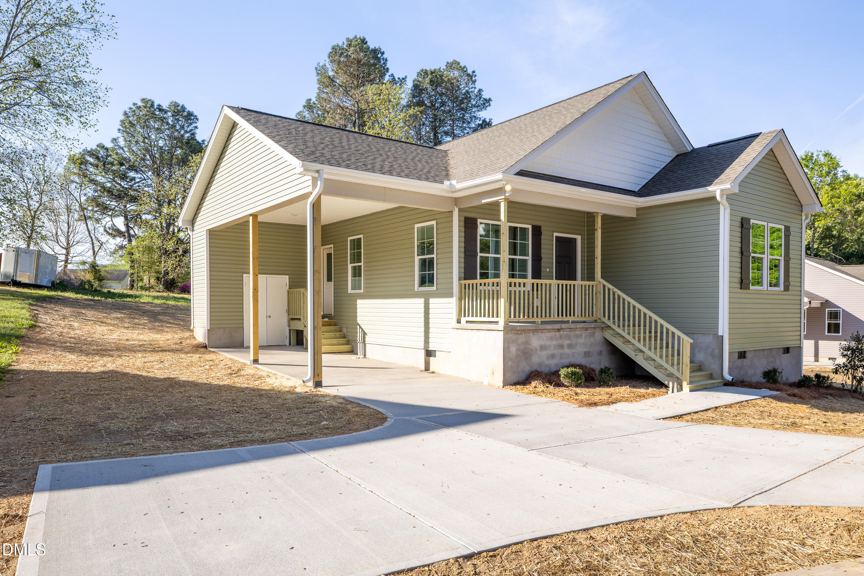 179 West Hamer Street Coats, NC 27521 - Photo 2 of 26 a view of a house with a yard