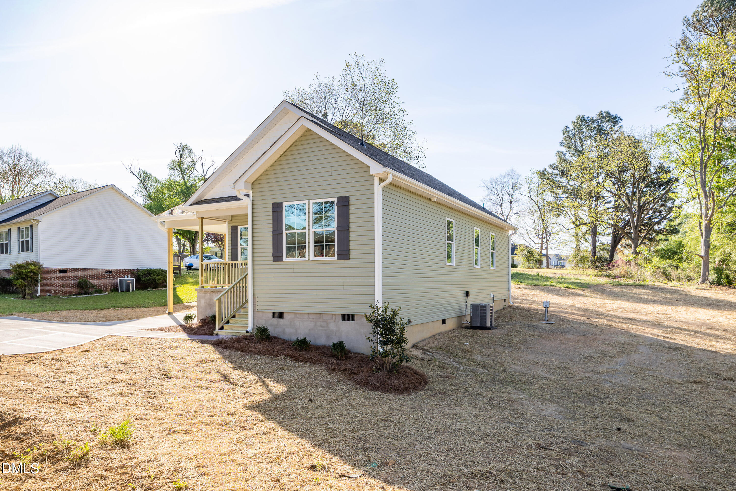 179 West Hamer Street Coats, NC 27521 - Photo 3 of 26 a view of a house with backyard