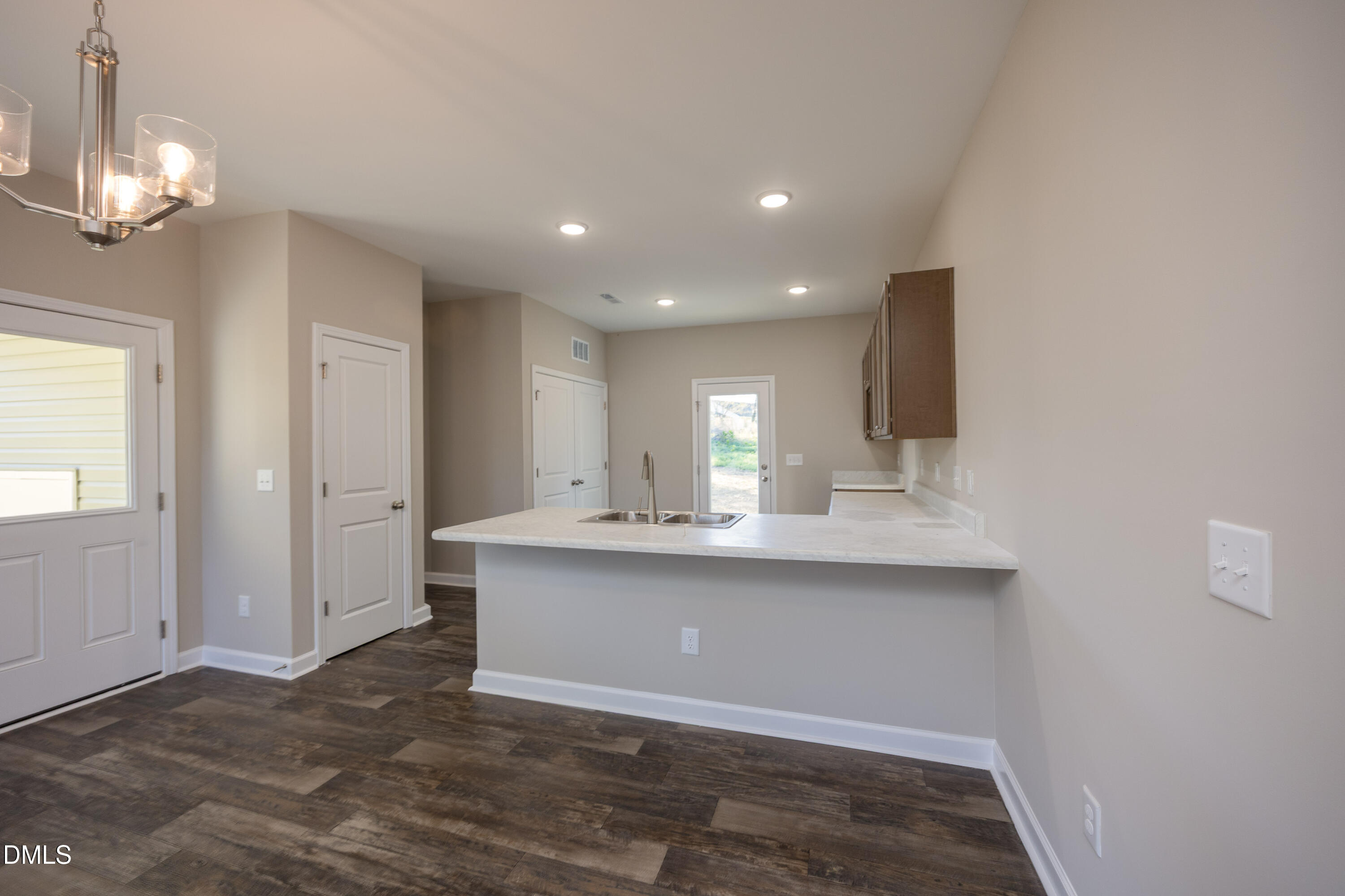 179 West Hamer Street Coats, NC 27521 - Photo 7 of 26 a view of kitchen with granite countertop cabinets and sink