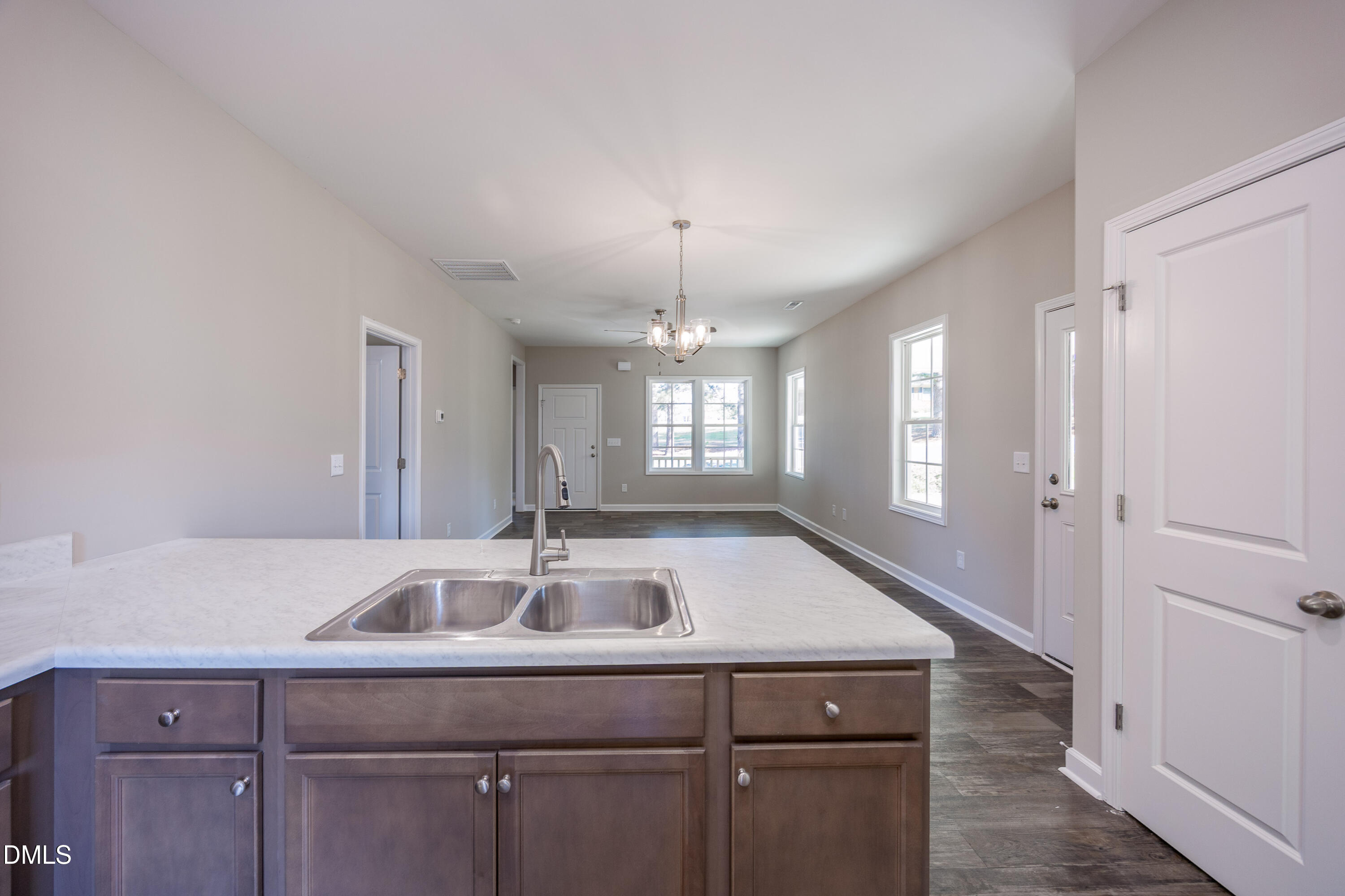 179 West Hamer Street Coats, NC 27521 - Photo 10 of 26 a sink with a granite countertop cabinets
