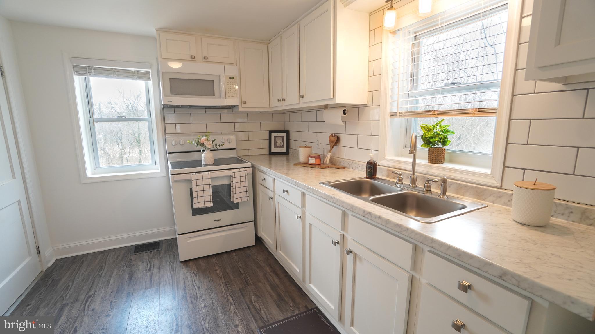 3708 Limekiln Road Sharpsburg, MD 21782 - Photo 14 of 33 a kitchen with appliances cabinets and a sink