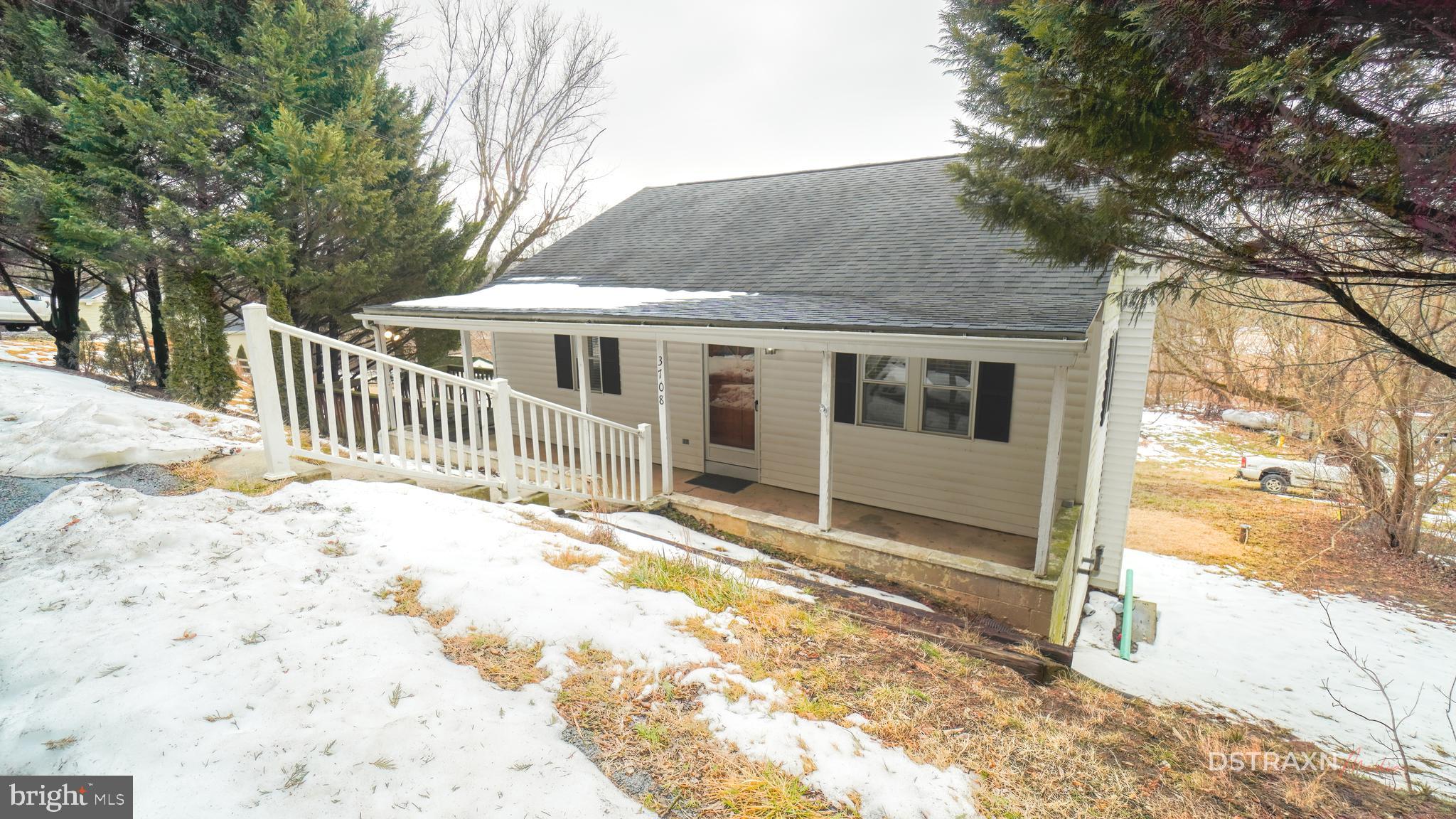 3708 Limekiln Road Sharpsburg, MD 21782 - Photo 2 of 33 a view of a house with a large tree and wooden fence